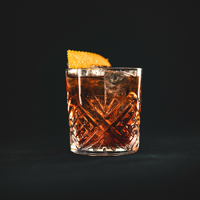 Old Fashioned cocktail in a rocks glass with a lemon garnish